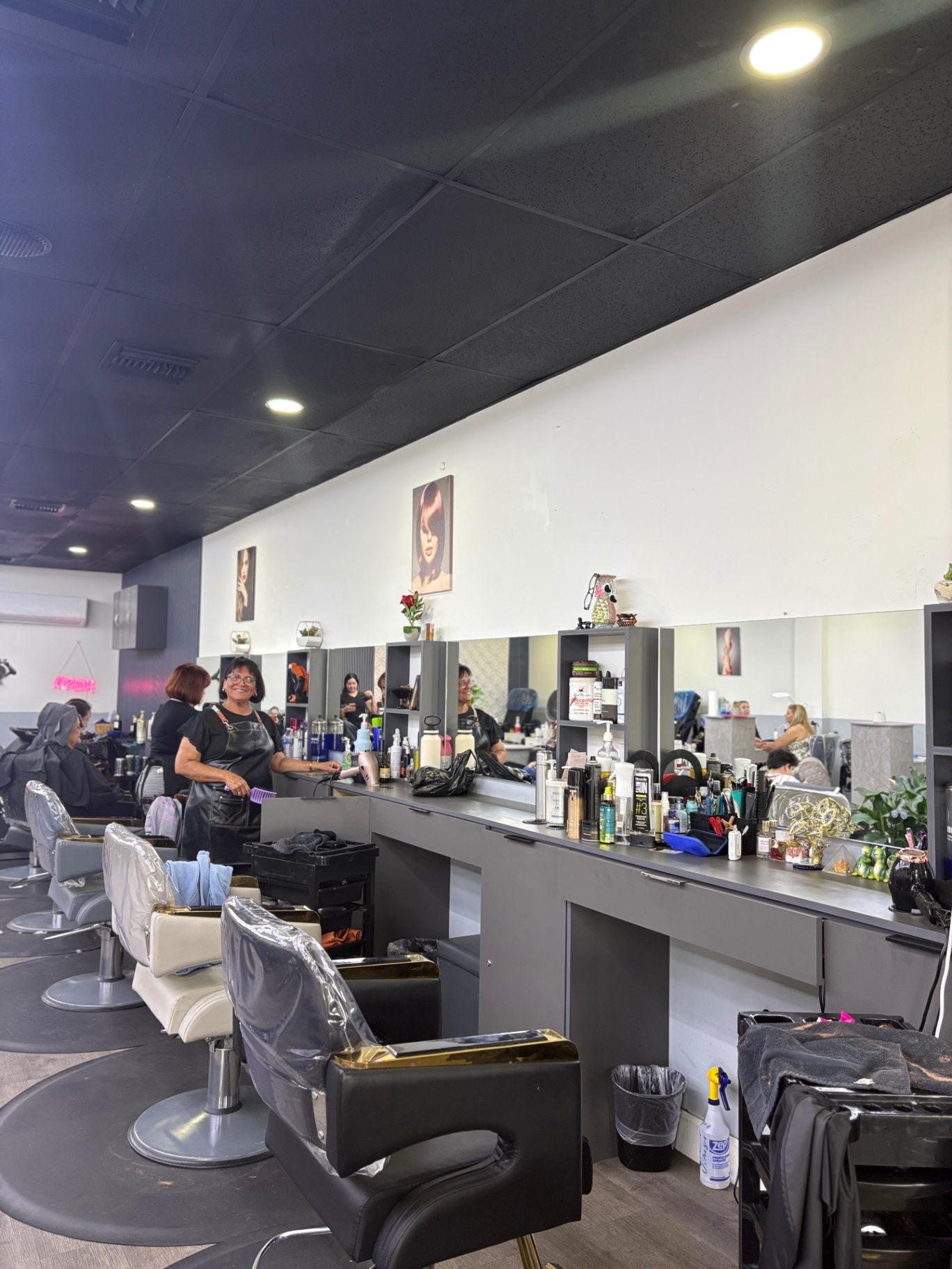 Wide view of hair stylists working at Natalie salon